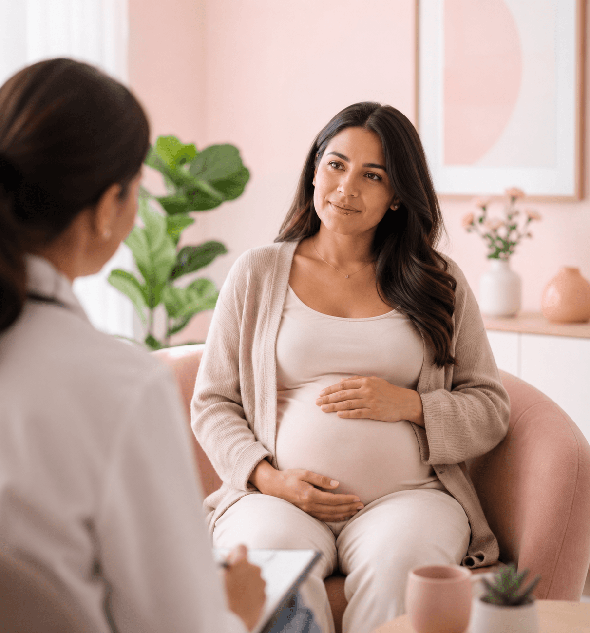 A pregnant woman speaking with a healthcare professional